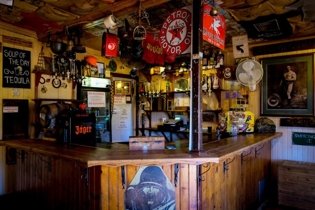 Cozy rustic bar with eclectic decor in Pilgrimsrest, South Africa.